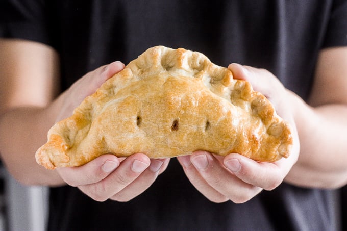 Easy homemade apple hand pies are the perfect fall treat -- stuffed with tender apples and cinnamon and wrapped in crispy, flakey, buttery crust. | aheadofthyme.com