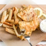 These healthy fish and chips are crispy on the outside and juicy, tender, and flakey on the inside. Pair it with homemade tartar sauce and say hello to comfort food heaven! | aheadofthyme.com