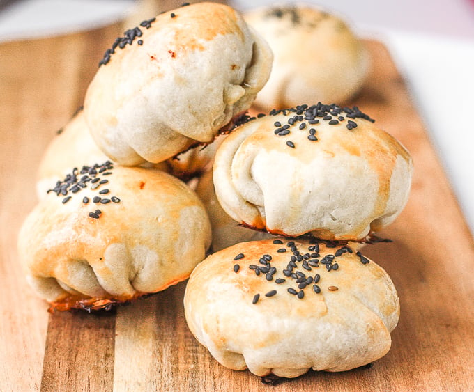 Mini meat pies with soy sauce are flakey puff pastries stuffed with delicious and juicy meat inside marinated with Asian flavours. | aheadofthyme.com