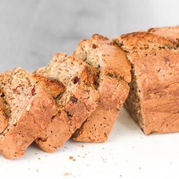 When you combine walnuts, raisins and dried fruit in a nutty banana bread, the result is a tender and moist loaf that is truly irresistible. | aheadofthyme.com