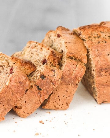 When you combine walnuts, raisins and dried fruit in a nutty banana bread, the result is a tender and moist loaf that is truly irresistible. | aheadofthyme.com