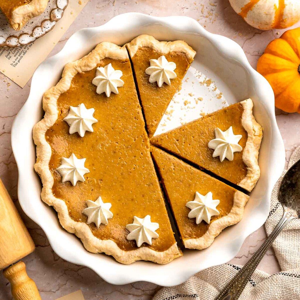 Classic Homemade Pumpkin Pie from Scratch features a buttery flaky crust and silky spiced filling — the perfect Thanksgiving dessert everyone loves. | aheadofthyme.com