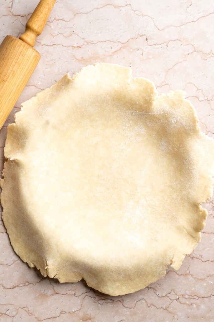 Classic Homemade Pumpkin Pie from Scratch features a buttery flaky crust and silky spiced filling - the perfect Thanksgiving dessert everyone loves. | aheadofthyme.com