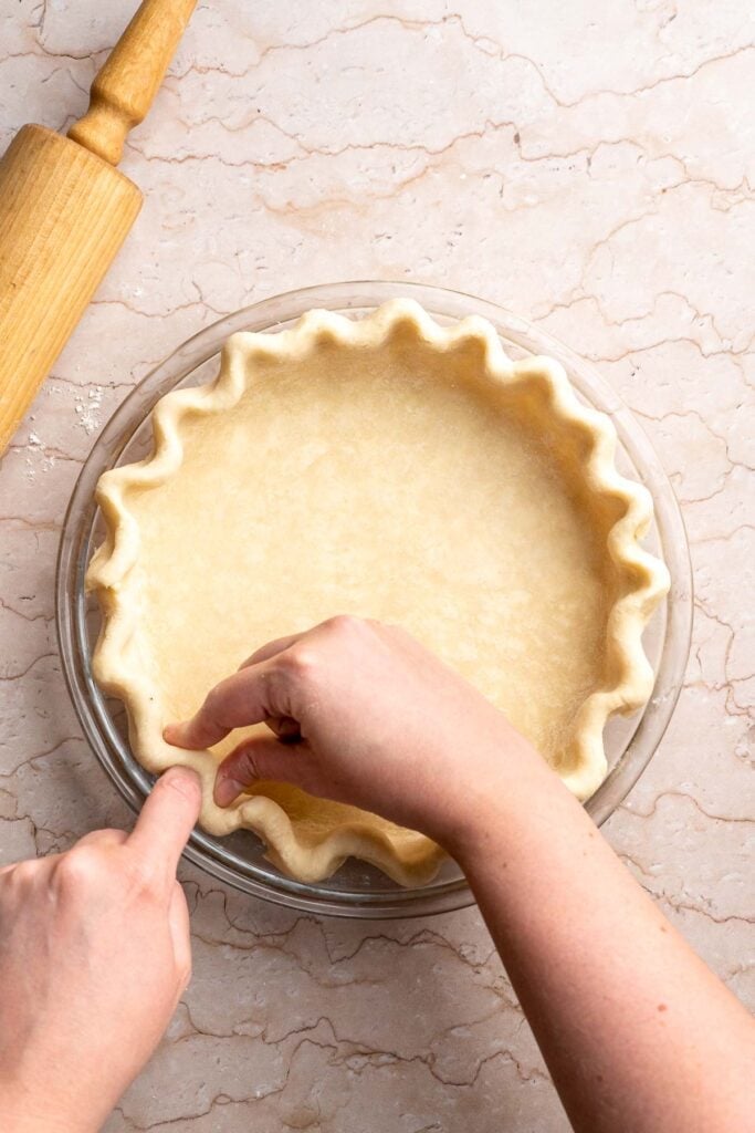 Classic Homemade Pumpkin Pie from Scratch features a buttery flaky crust and silky spiced filling - the perfect Thanksgiving dessert everyone loves. | aheadofthyme.com
