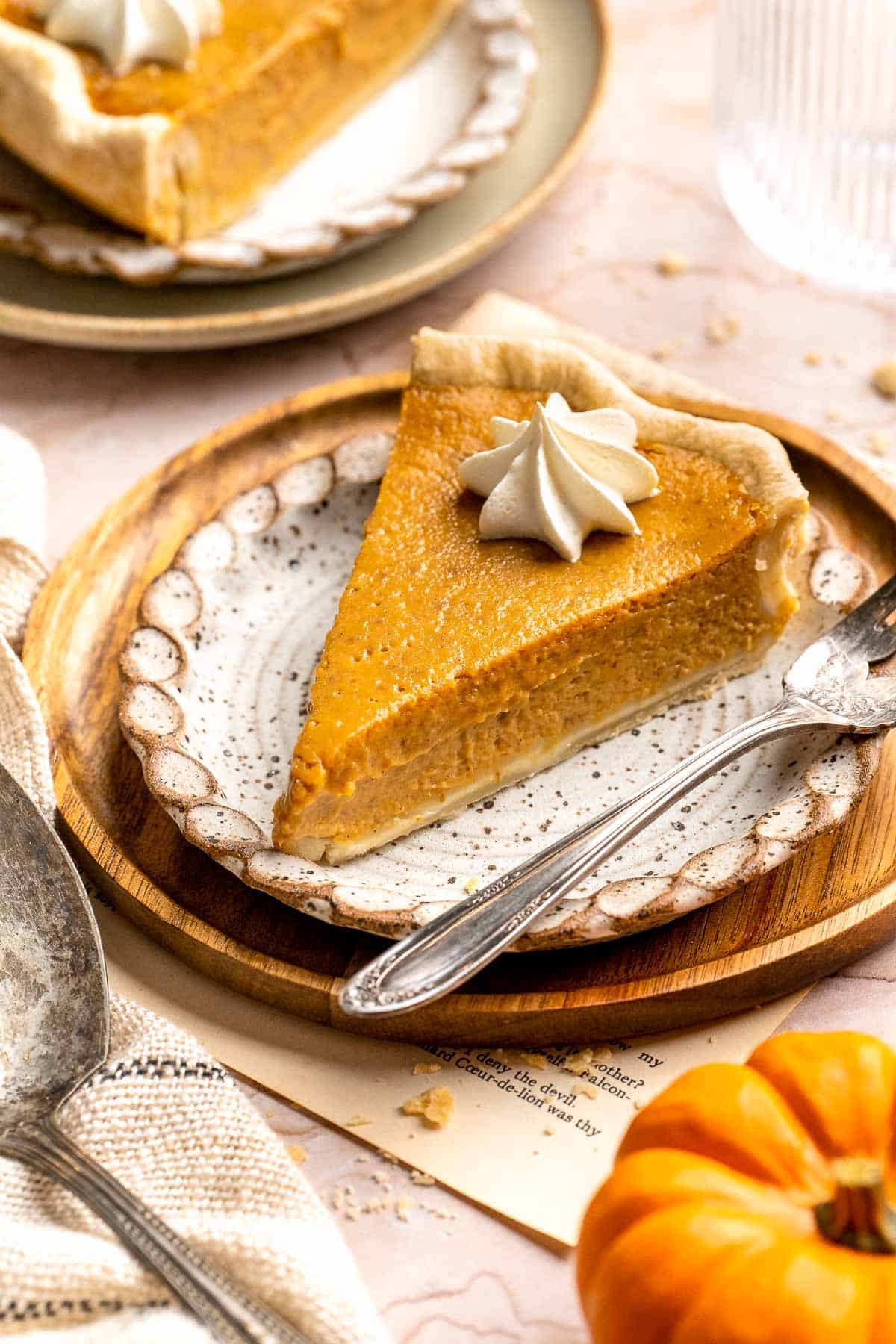 Classic Homemade Pumpkin Pie from Scratch features a buttery flaky crust and silky spiced filling - the perfect Thanksgiving dessert everyone loves. | aheadofthyme.com