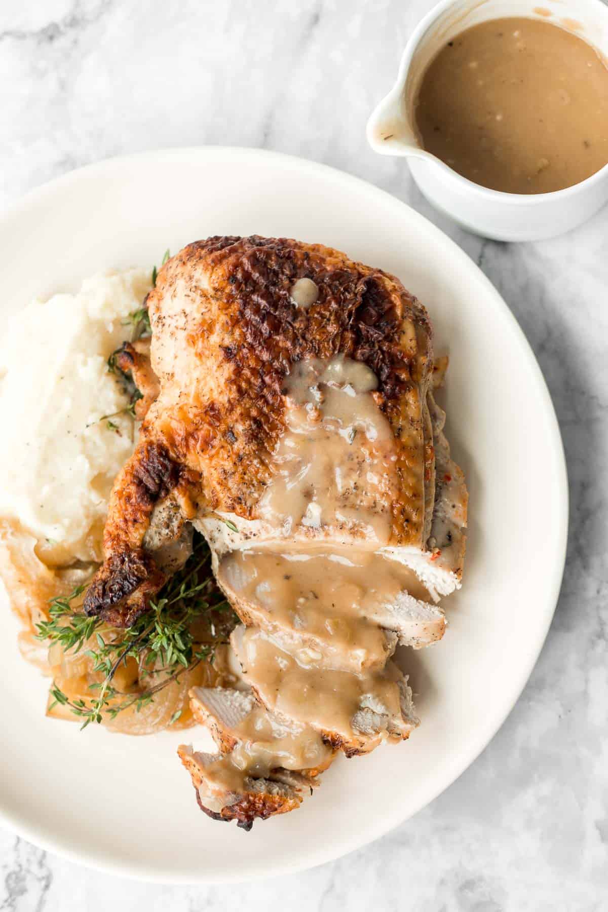 This easy Juicy Roasted Turkey Breast is the perfect main course for a small, intimate Thanksgiving dinner without the hassle of roasting a whole bird. | aheadofthyme.com