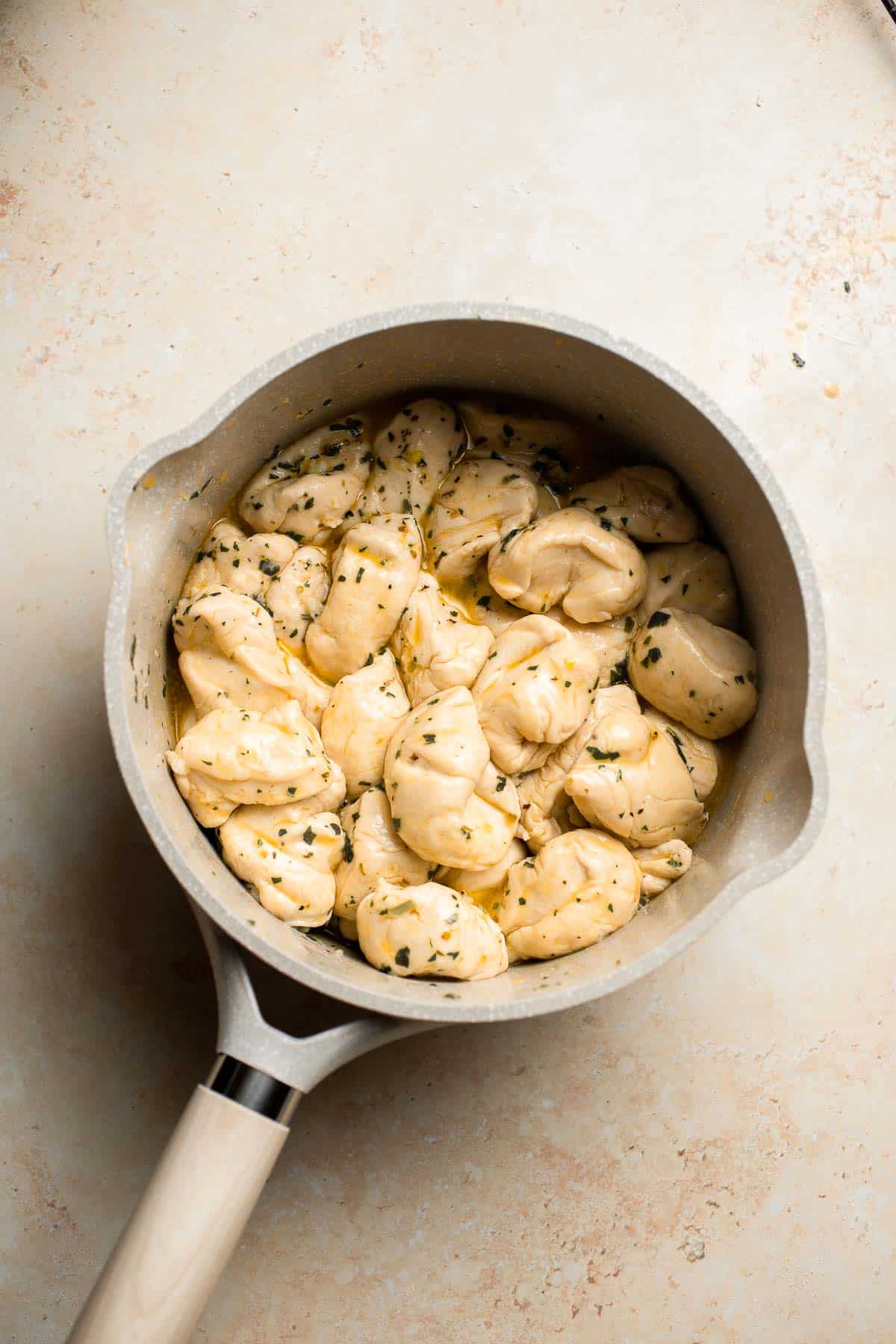 Homemade Pull Apart Garlic Bread is fluffy, buttery, flavourful, and tears easily for optimal sharing. You won't be able to stop grabbing these bites! | aheadofthyme.com