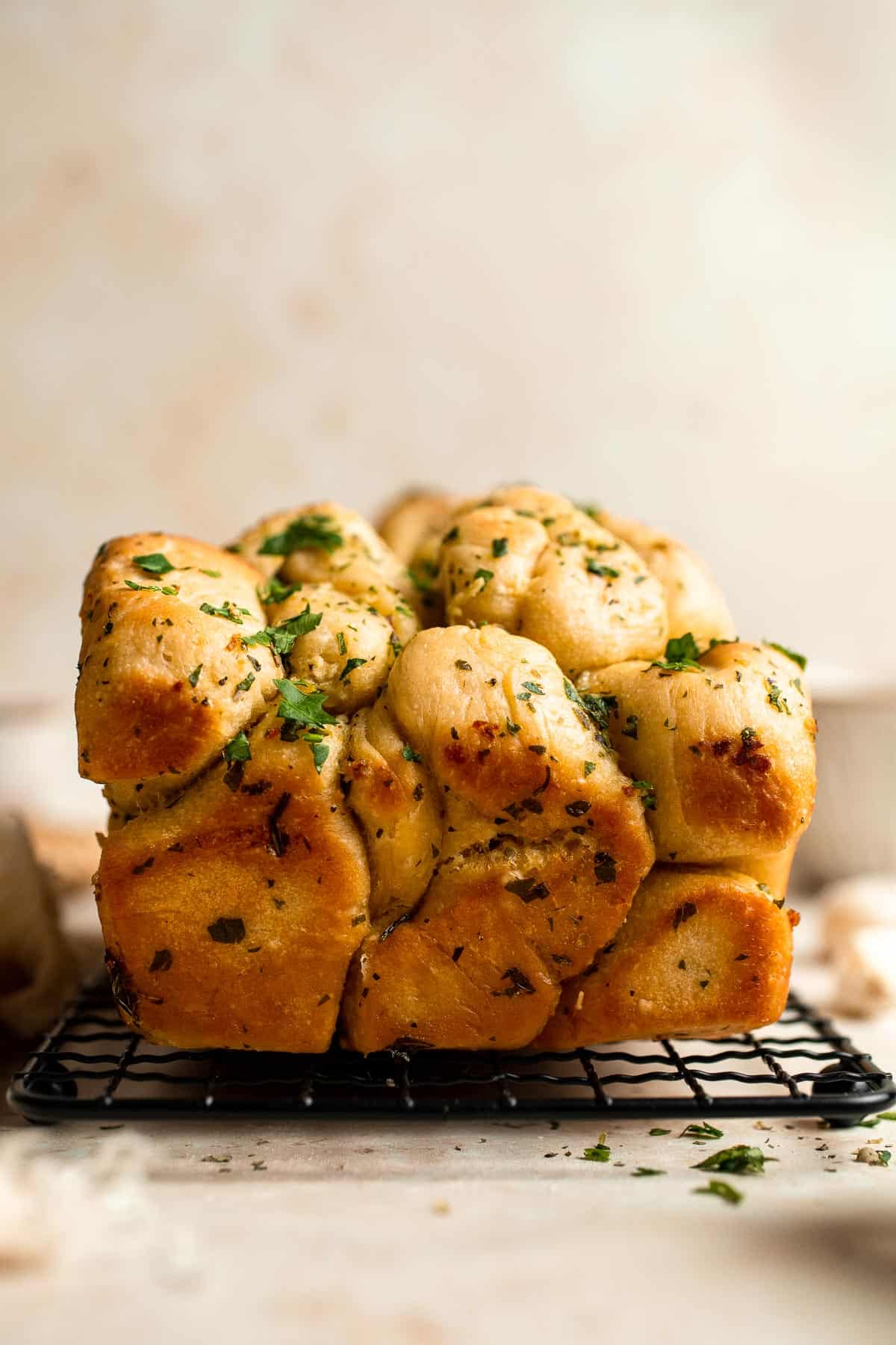 Homemade Pull Apart Garlic Bread is fluffy, buttery, flavourful, and tears easily for optimal sharing. You won't be able to stop grabbing these bites! | aheadofthyme.com