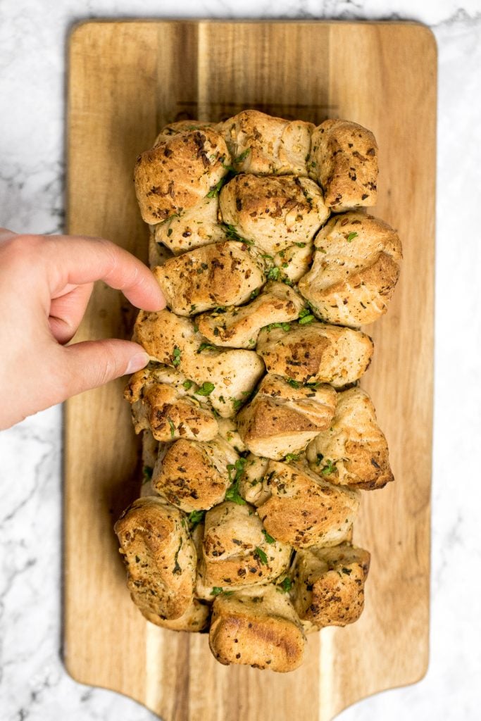 Pull apart garlic bread is fluffy, buttery, flavourful, melts in your mouth, and tears easily for optimal sharing. You don't need any other bread at the dinner table. | aheadofthyme.com