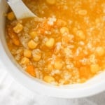 When east meets west, savoury pumpkin congee rice porridge with corn is born. It's thick and creamy -- the ultimate fall comfort food. | aheadofthyme.com