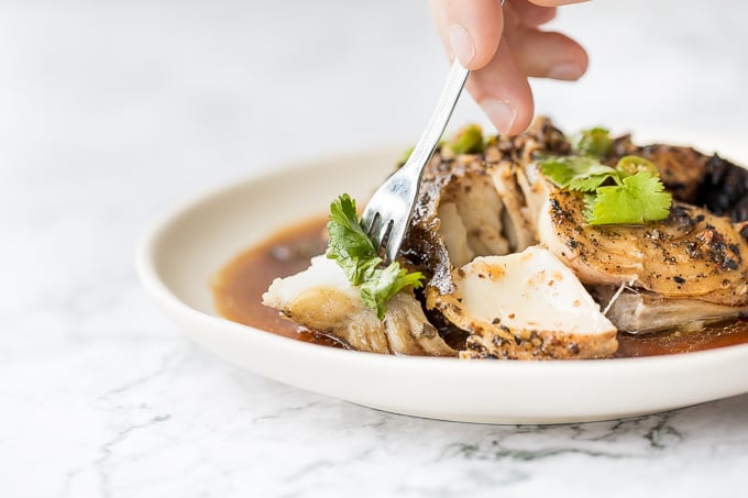 Flaky, oily, and tender air fryer cod with black bean sauce is bursting with flavour and takes less than 20 minutes to make. The perfect weeknight dinner. | aheadofthyme.com