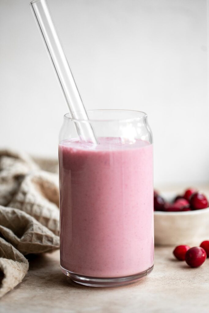 Leftover cranberry sauce smoothie is the perfect drink to make with holiday leftovers. Plus, this sweet and refreshing winter smoothie in ready in minutes. | aheadofthyme.com