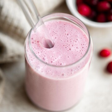 Leftover cranberry sauce smoothie is the perfect drink to make with holiday leftovers. Plus, this sweet and refreshing winter smoothie in ready in minutes. | aheadofthyme.com