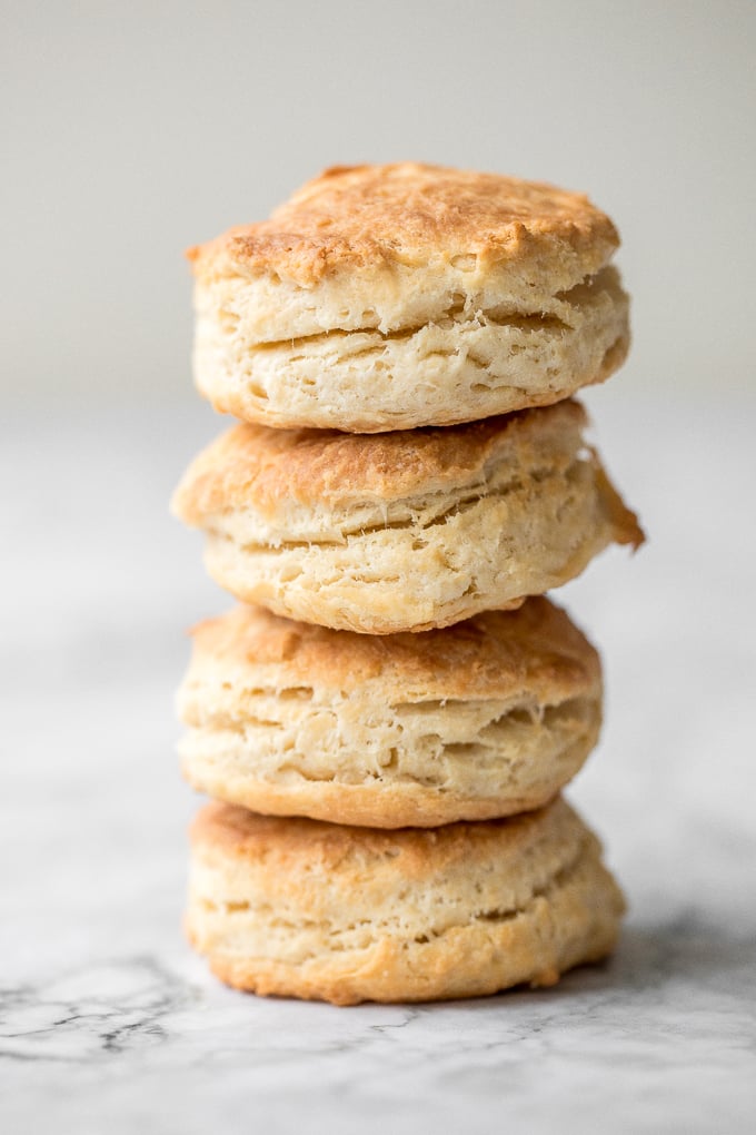 Flaky, fluffy, buttery, and soft, these easy homemade biscuits come together with only a handful of ingredients you already have at home! | aheadofthyme.com