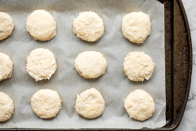 Flaky, fluffy, buttery, and soft, these easy homemade biscuits come together with only a handful of ingredients you already have at home! | aheadofthyme.com