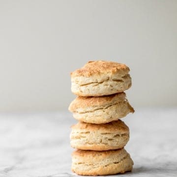 Flaky, fluffy, buttery, and soft, these easy homemade biscuits come together with only a handful of ingredients you already have at home! | aheadofthyme.com