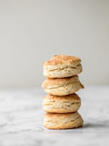 Flaky, fluffy, buttery, and soft, these easy homemade biscuits come together with only a handful of ingredients you already have at home! | aheadofthyme.com