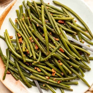 Green Beans with Pecans is a delicious and nutritious way to dress up earthy green beans with crunchy pecans. Serve this easy side dish any day! | aheadofthyme.com