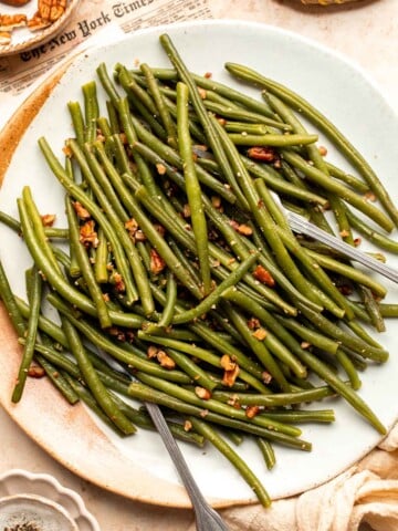 Green Beans with Pecans is a delicious and nutritious way to dress up earthy green beans with crunchy pecans. Serve this easy side dish any day! | aheadofthyme.com