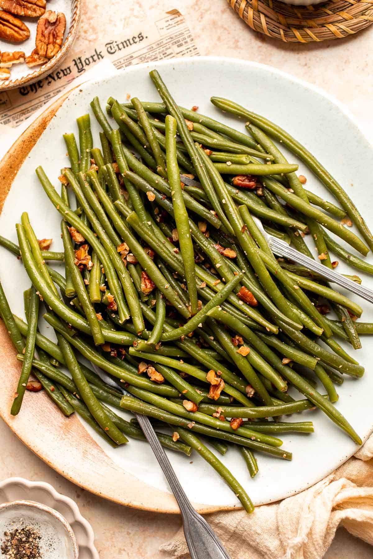 Green Beans with Pecans is a delicious and nutritious way to dress up earthy green beans with crunchy pecans. Serve this easy side dish any day! | aheadofthyme.com