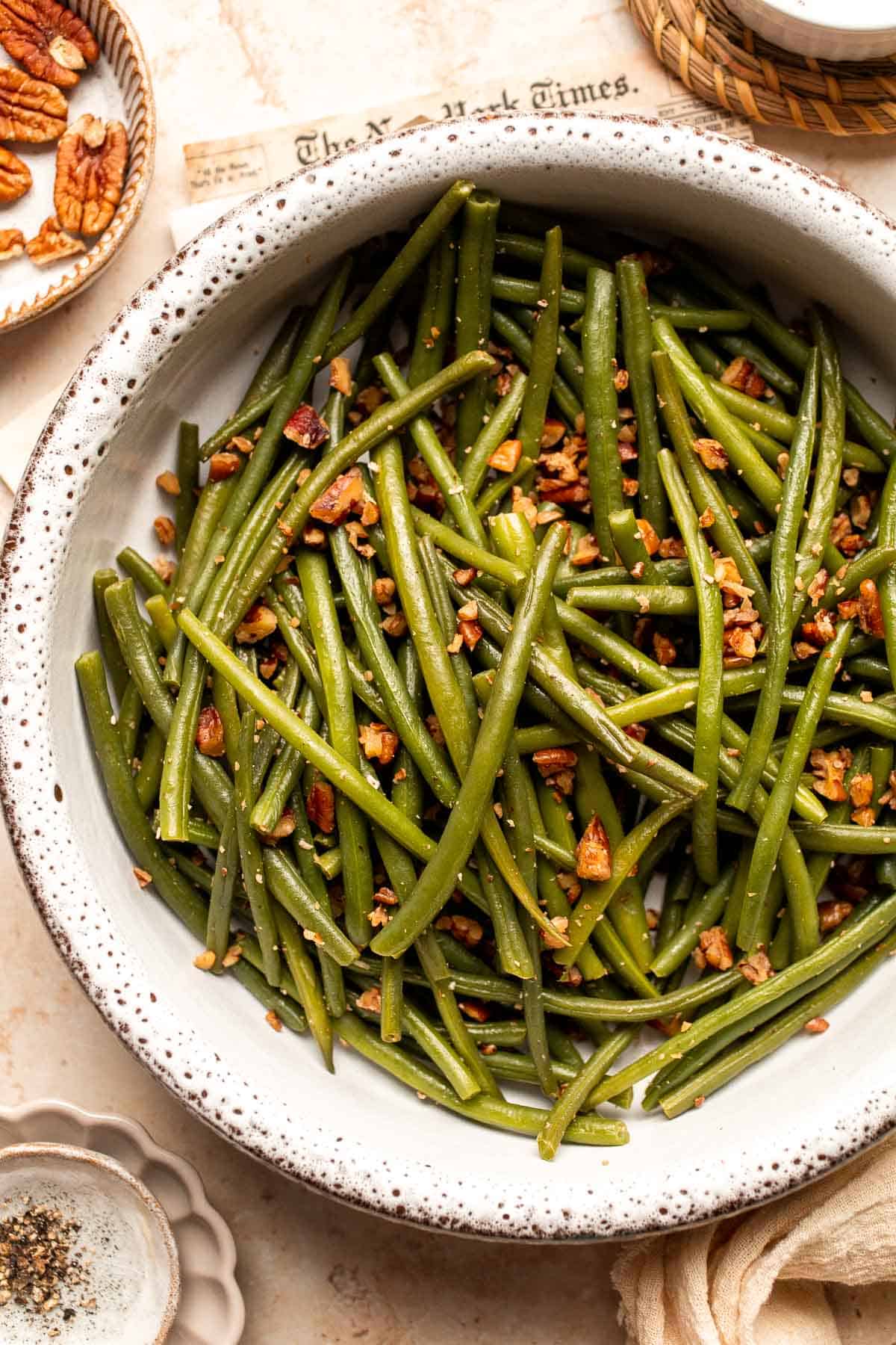 Green Beans with Pecans is a delicious and nutritious way to dress up earthy green beans with crunchy pecans. Serve this easy side dish any day! | aheadofthyme.com