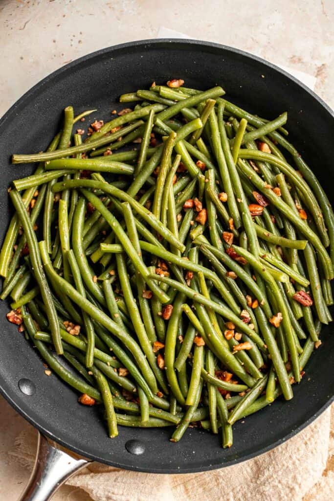Green Beans with Pecans is a delicious and nutritious way to dress up earthy green beans with crunchy pecans. Serve this easy side dish any day! | aheadofthyme.com