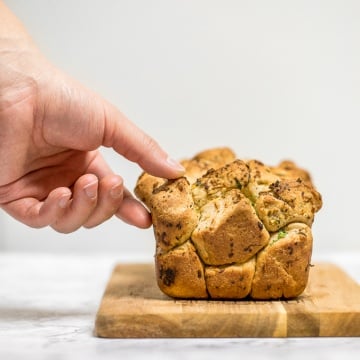 Pull apart garlic bread is fluffy, buttery, flavourful, melts in your mouth, and tears easily for optimal sharing. You don't need any other bread at the dinner table. | aheadofthyme.com
