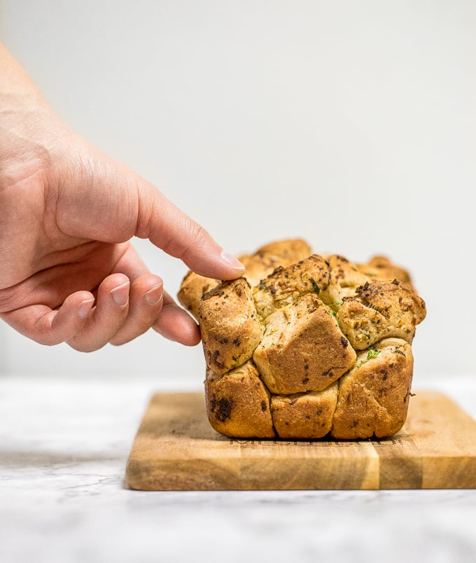 Pull apart garlic bread is fluffy, buttery, flavourful, melts in your mouth, and tears easily for optimal sharing. You don't need any other bread at the dinner table. | aheadofthyme.com