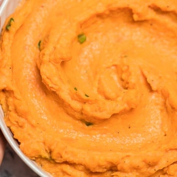 Velvety, smooth, and creamy, this savoury mashed sweet potatoes dish is quick and easy and can be made ahead of time -- it is the perfect side for your holiday meal. | aheadofthyme.com