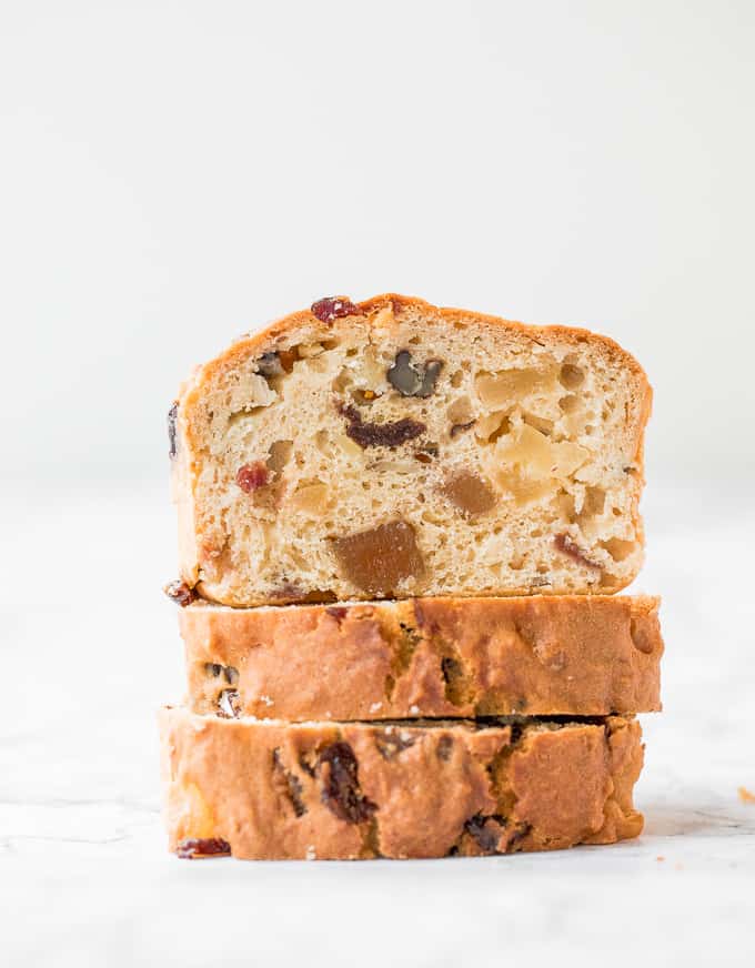 Perfect for the holidays, this super moist and tender, festive yogurt fruitcake is loaded with dried fruits and nuts for a burst of flavour in every bite. | aheadofthyme.com