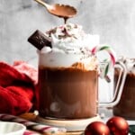 Cozy, creamy peppermint hot chocolate made with real chocolate, warm milk, and a touch of peppermint extract. Perfect for winter nights and holiday treats. | aheaofthyme.com