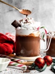 Cozy, creamy peppermint hot chocolate made with real chocolate, warm milk, and a touch of peppermint extract. Perfect for winter nights and holiday treats. | aheaofthyme.com