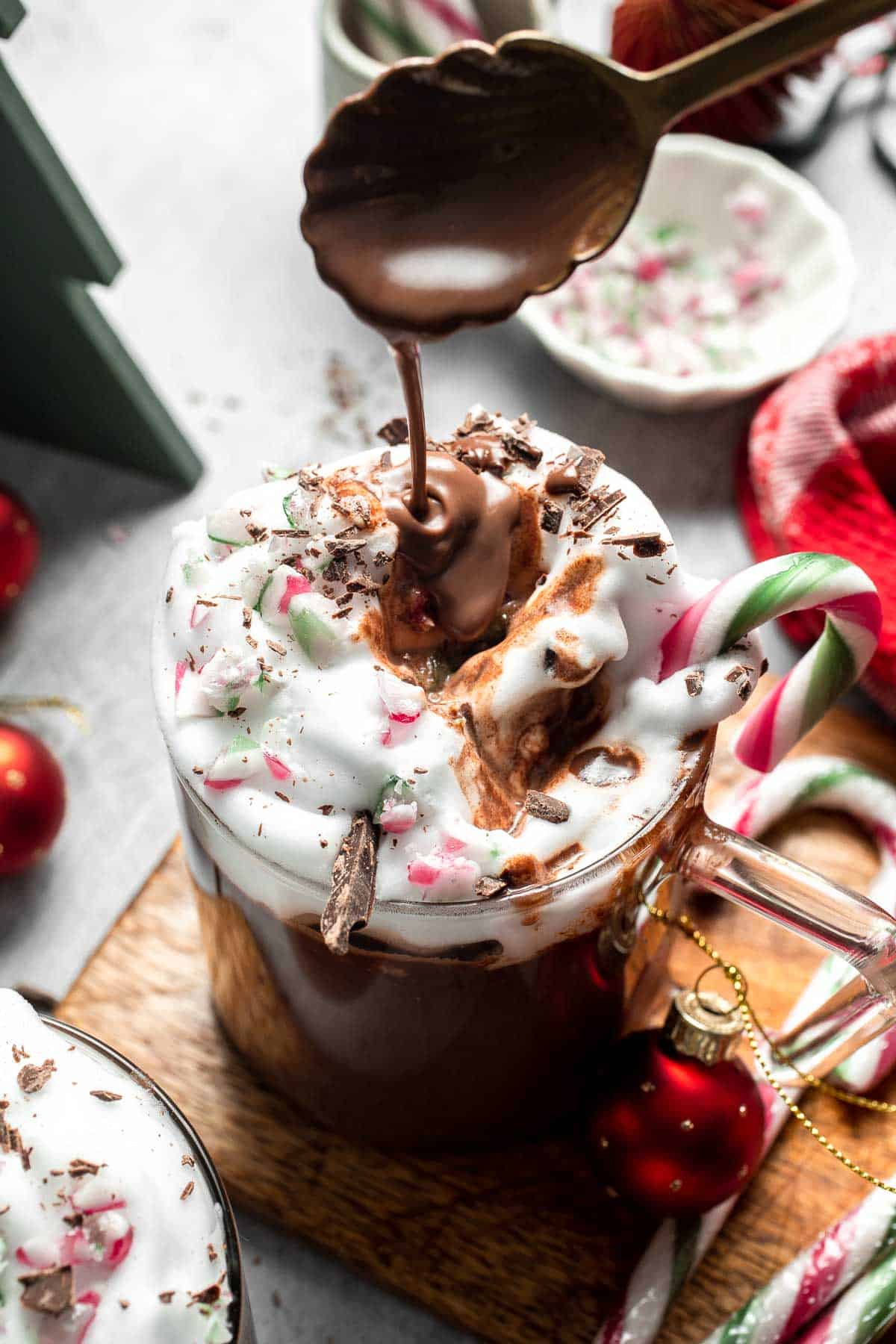 Cozy, creamy peppermint hot chocolate made with real chocolate, warm milk, and a touch of peppermint extract. Perfect for winter nights and holiday treats. | aheaofthyme.com