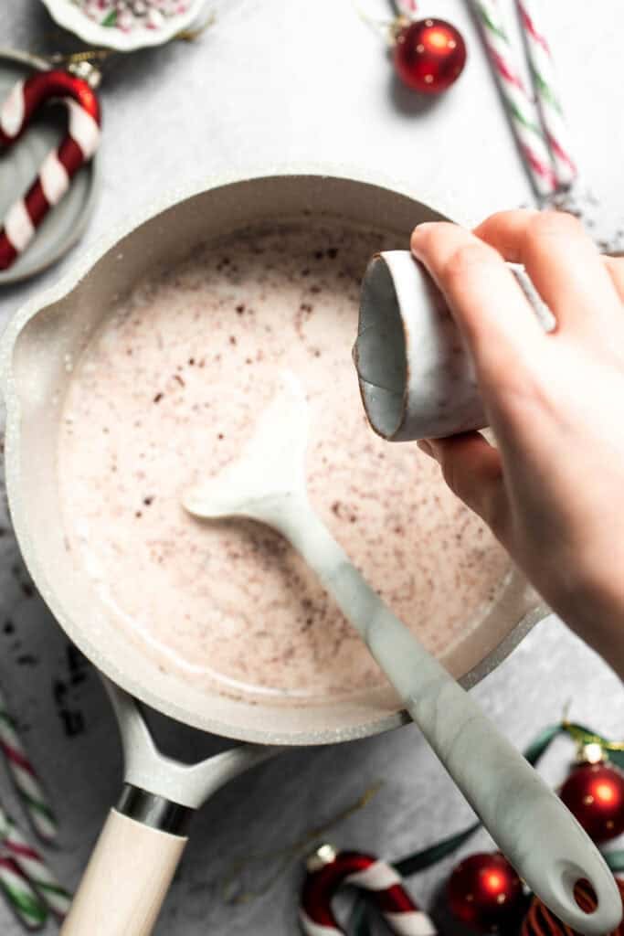 Cozy, creamy peppermint hot chocolate made with real chocolate, warm milk, and a touch of peppermint extract. Perfect for winter nights and holiday treats. | aheaofthyme.com