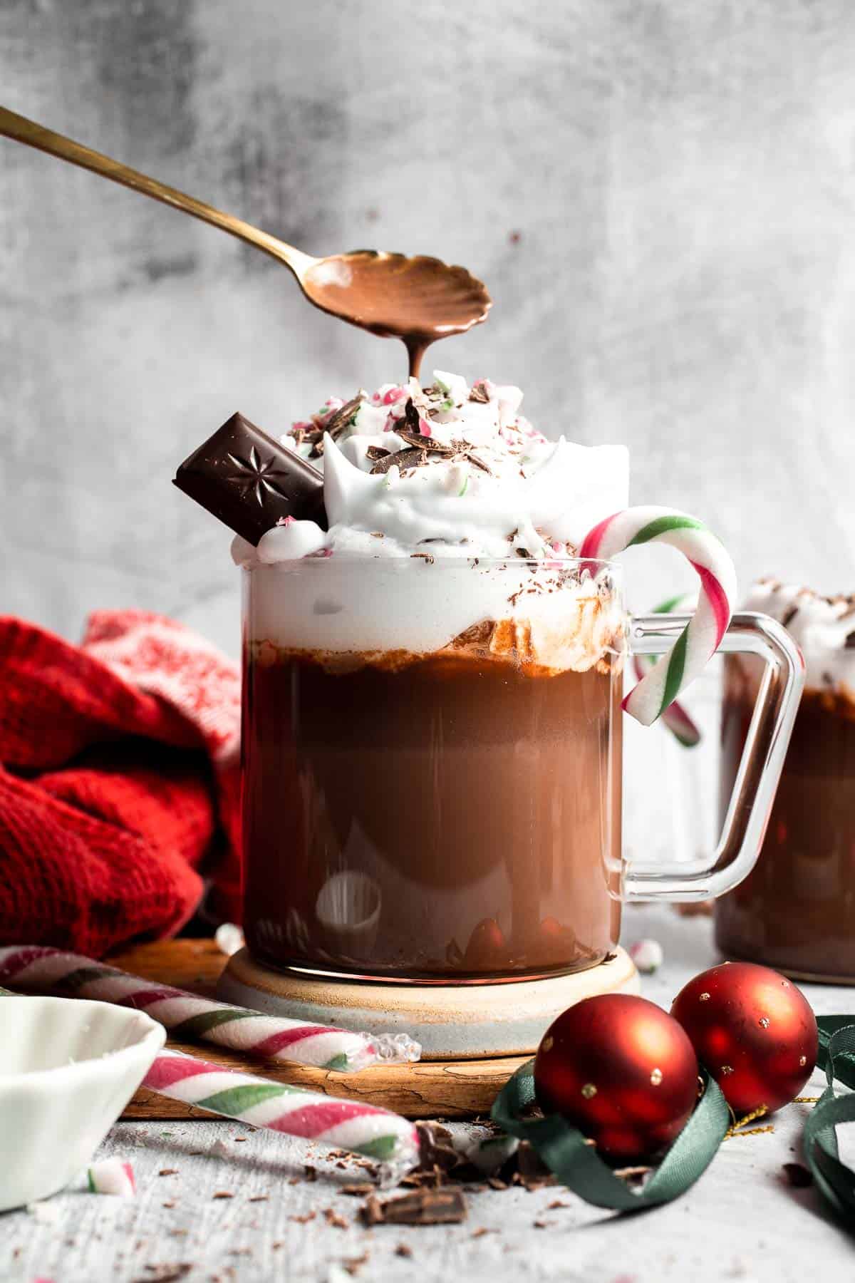Cozy, creamy peppermint hot chocolate made with real chocolate, warm milk, and a touch of peppermint extract. Perfect for winter nights and holiday treats. | aheaofthyme.com