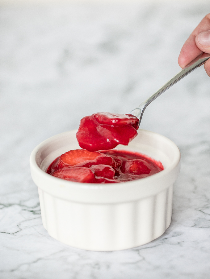 Easy to make, 3-ingredient homemade strawberry sauce is the perfect topping for all your dessert dishes. Pour this over pancakes, waffles, crepes, cheesecakes and more! | aheadofthyme.com