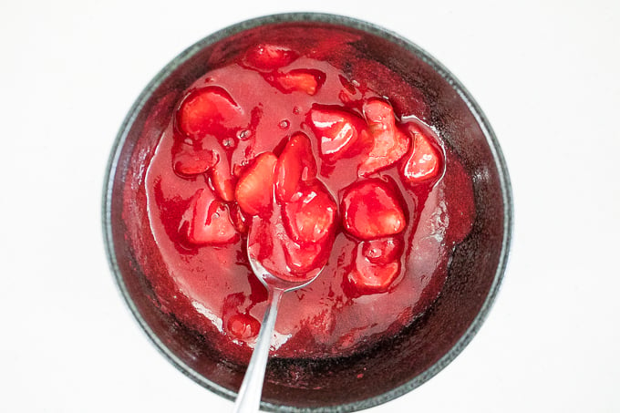 Easy to make, 3-ingredient homemade strawberry sauce is the perfect topping for all your dessert dishes. Pour this over pancakes, waffles, crepes, cheesecakes and more! | aheadofthyme.com