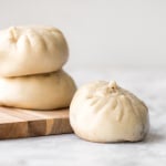 Homemade Shanghai style vegetarian steamed buns is spongy with a juicy, flavourful bok choy and mushroom filling inside bursting with Asian flavours. | aheadofthyme.com