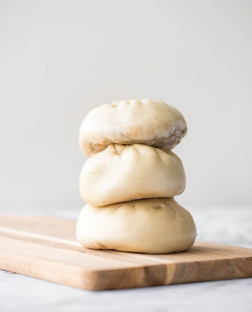 Homemade Shanghai style vegetarian steamed buns is spongy with a juicy, flavourful bok choy and mushroom filling inside bursting with Asian flavours. | aheadofthyme.com