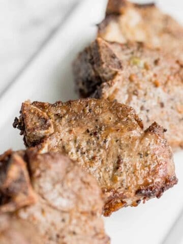 Juicy, tender, and delicious, Air Fryer Lamb Chops are flavorfully marinated and then air fried for under 15 minutes. Change the way you cook lamb forever! | aheadofthyme.com