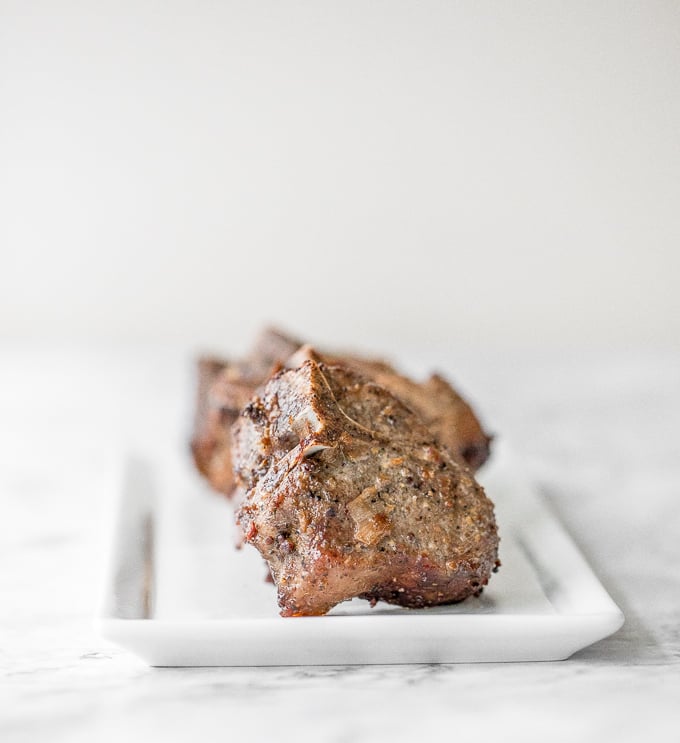 Juicy, tender, and delicious 18-minute air fryer lamb chops is marinated in a dijon sauce and will change the way you cook lamb forever! | aheadofthyme.com