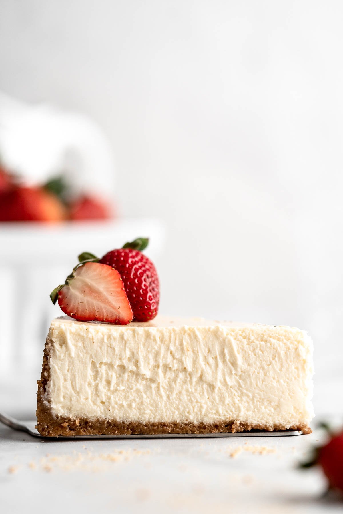 Classic New York Cheesecake is stunning, delicious, rich, and creamy. Plus, it's surprisingly easy to make from scratch — even for beginners! | aheadofthyme.com