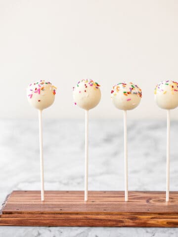 The cutest bite-sized treat to serve at any event are vanilla cake pops from scratch -- luckily, they are actually simple and easy to make! | aheadofthyme.com
