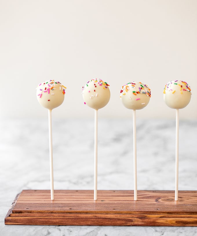 The cutest bite-sized treat to serve at any event are vanilla cake pops from scratch -- luckily, they are actually simple and easy to make! | aheadofthyme.com