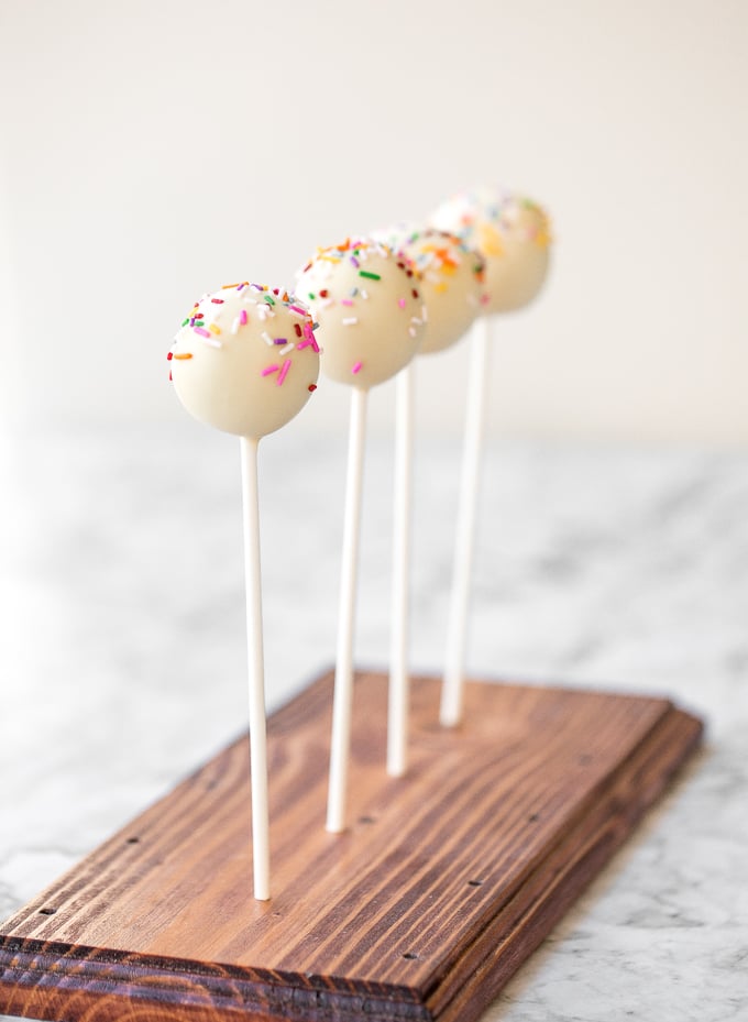 The cutest bite-sized treat to serve at any event are vanilla cake pops from scratch -- luckily, they are actually simple and easy to make! | aheadofthyme.com