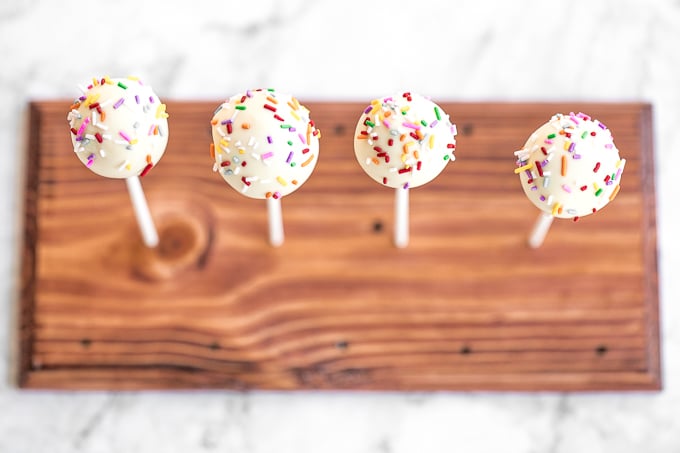 The cutest bite-sized treat to serve at any event are vanilla cake pops from scratch -- luckily, they are actually simple and easy to make! | aheadofthyme.com