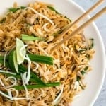 No more takeout when you can make flavourful, restaurant-style, authentic chicken Pad Thai at home in just 10 minutes. It's sweet, savoury, sour and nutty. | aheadofthyme.com