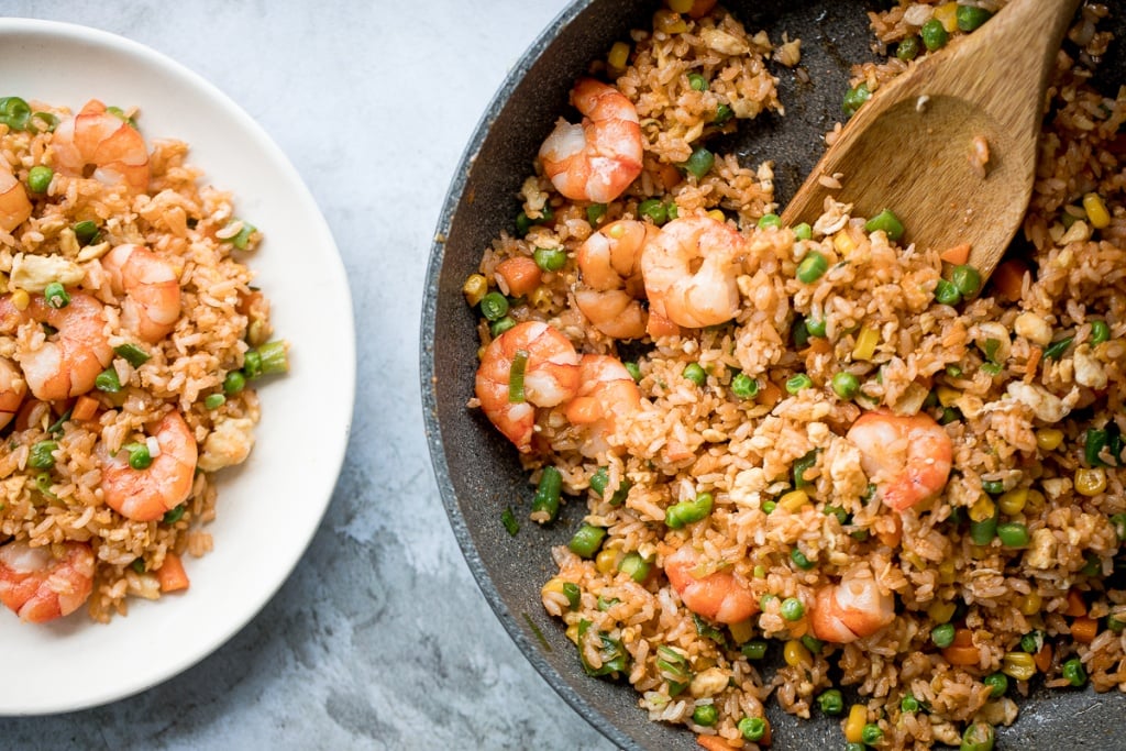 Quick and easy, one-pan, 10-minute seafood fried rice with tiger prawns is so much healthier, tastier and better than takeout. It's the easiest weeknight meal. | aheadofthyme.com