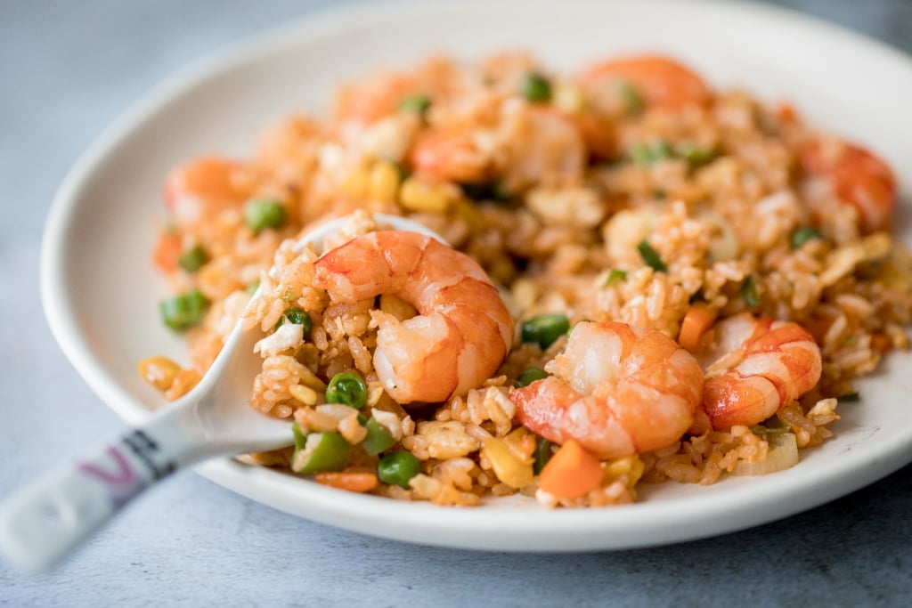 Quick and easy, one-pan, 10-minute seafood fried rice with tiger prawns is so much healthier, tastier and better than takeout. It's the easiest weeknight meal. | aheadofthyme.com