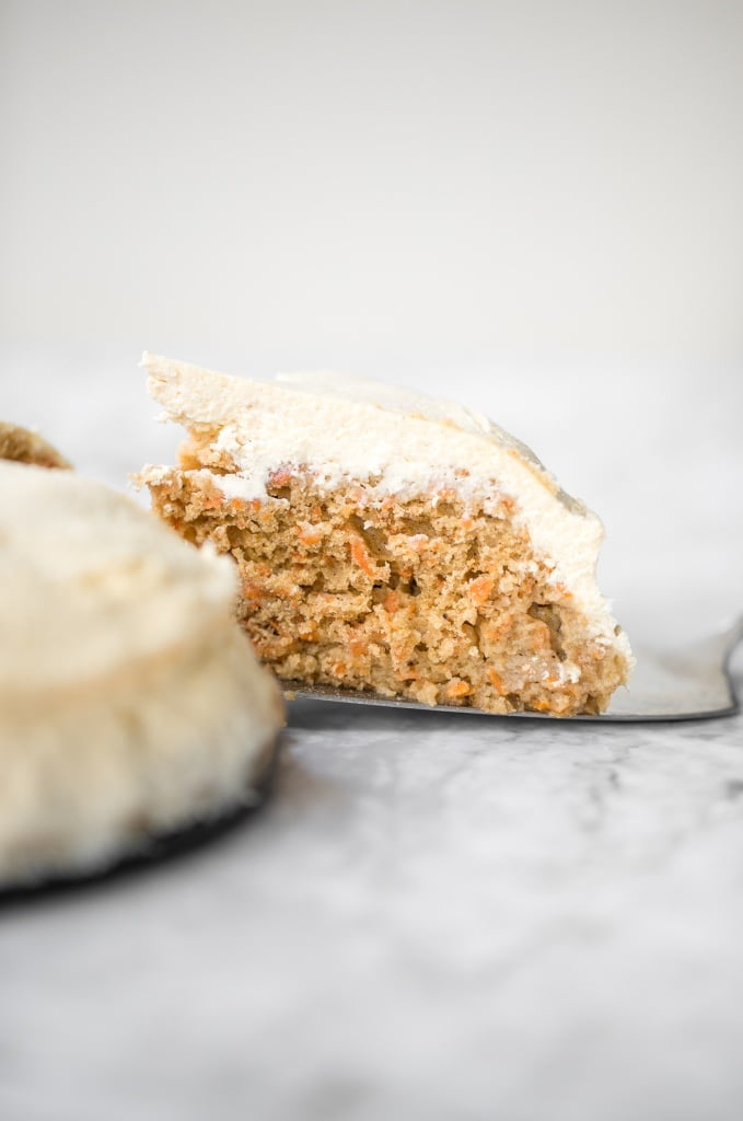 Super moist and perfectly spiced carrot cake with a creamy cheesecake topping is flavourful, comforting, and the perfect homemade spring dessert. | aheadofthyme.com